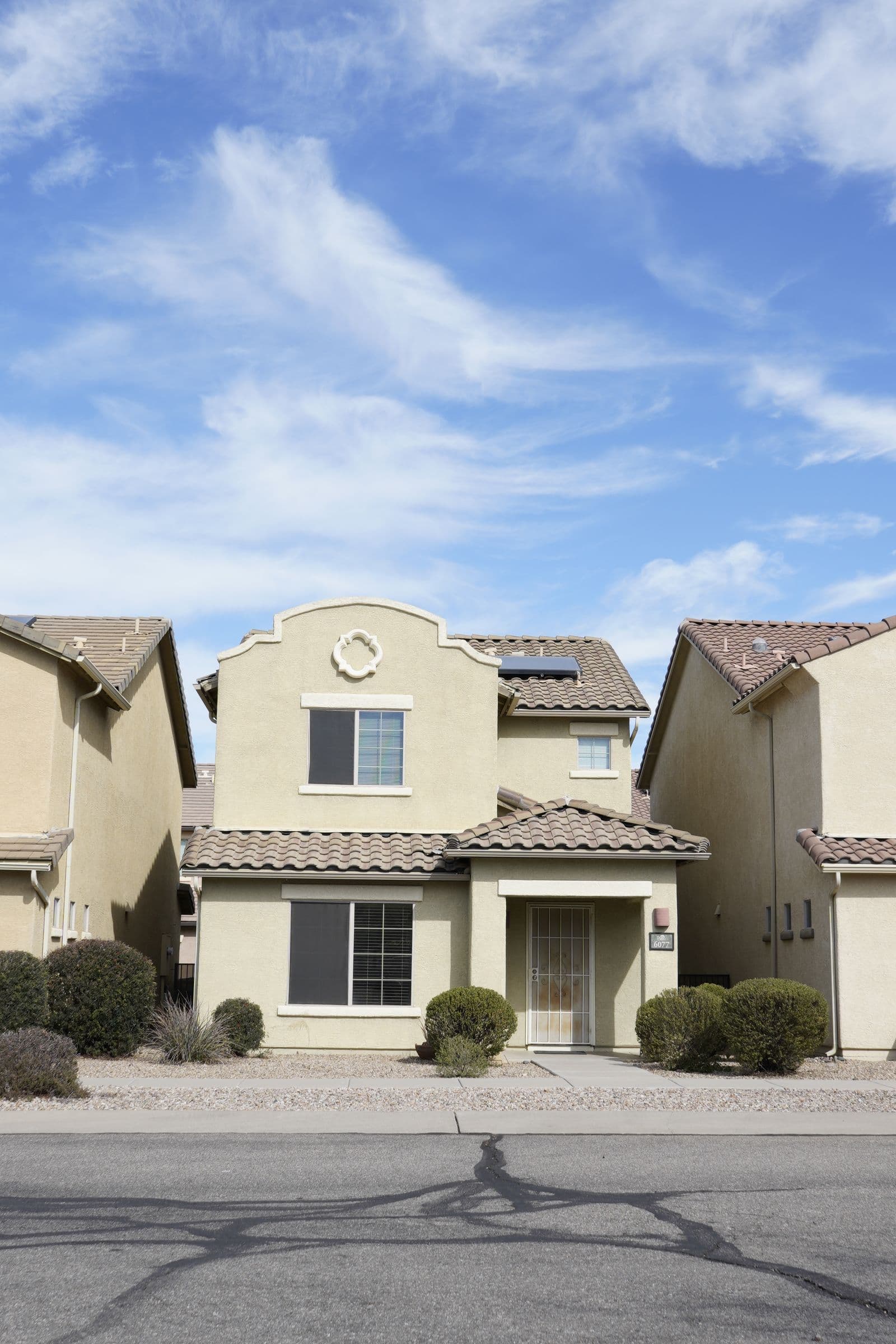 Stucco homes with tile roofs typical of the Coolidge area